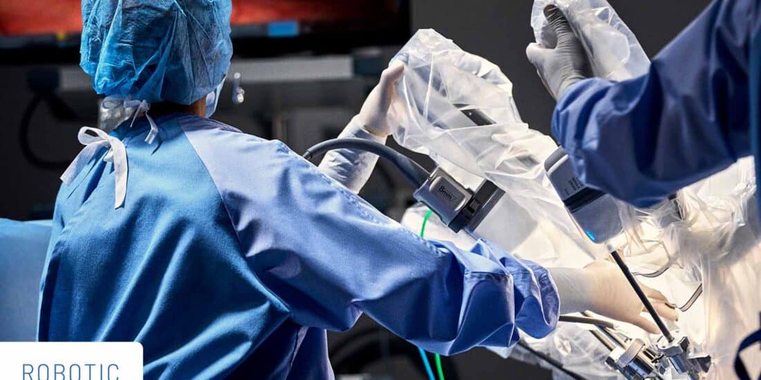 Image of a surgeon using a DaVinci robot to perform a robotic surgery.